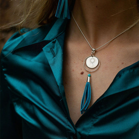 Big Sky necklace with turquoise blue leather fringe